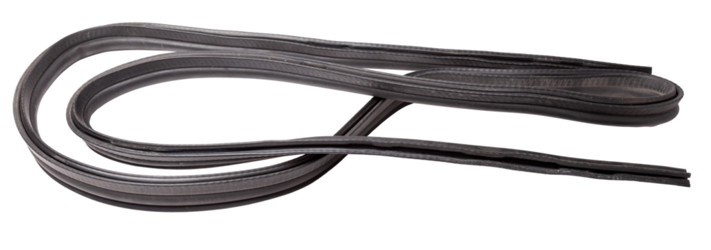 Rolled up black rubber sealant for elements of the car body, doors or trunk, for noise insulation, thermal and sound, preventing heat loss in the car interior. Sealing gasket for repair in a workshop.