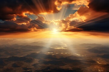 The suns rays break through the clouds, illuminating the Earth below