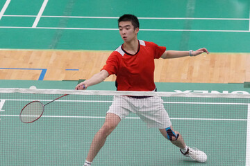 A very focused player who plays single badminton