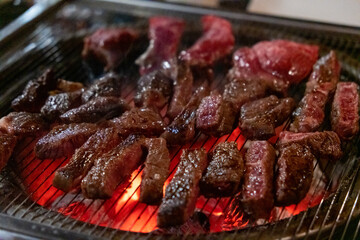 Hanwoo Beef, Korean Style Meat on the Grill. BBQ rare meat with soft focus
