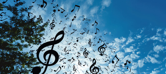 Musical Notes Swirling in Blue Sky