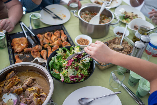 Big Group of Family Friends Having Dinner