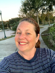 Middle-age woman taking a selfie