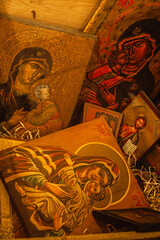 A wooden box of ancient Orthodox icons symbolizing the communist religious persecutions against Christians - 789523005