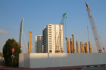 A construction site with cranes