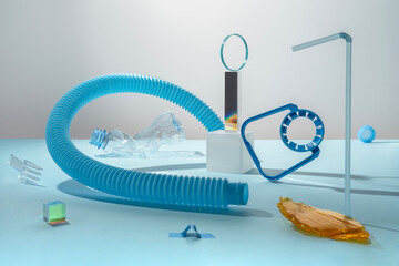 Abstract art composition with different plastic waste on blue backdrop