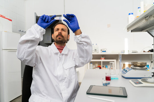  scientist researcher working on biotech laboratory