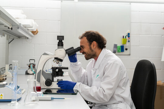  scientist researcher working on biotech laboratory