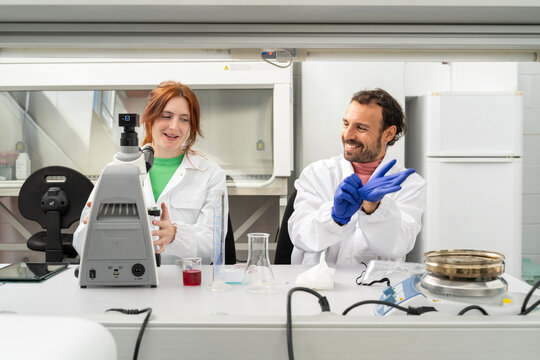 scientists working in biotech laboratory