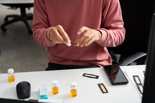  scientist researcher working on biotech laboratory office