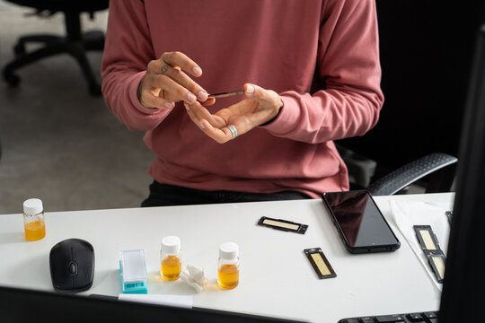  scientist researcher working on biotech laboratory office