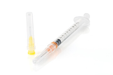 Plastic insulin syringe isolated on white background. Close-up - obrazy, fototapety, plakaty
