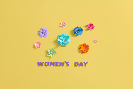 happy women's day paper cut style background.