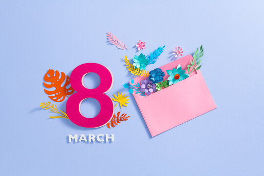 International women day. 8th march with papercut of flowers