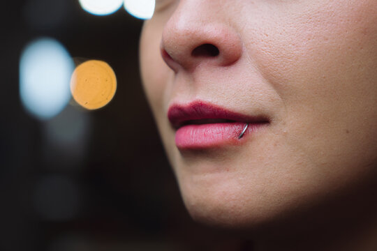 Woman with a side labret piercing