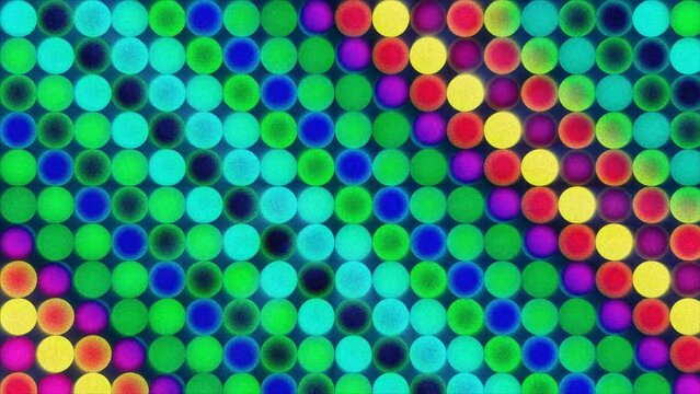 Colorful dots motion background. Rainbow comic dot animation with grain effect. Wave pattern. Retro and Vintage Pattern animation