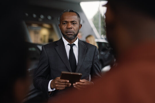Conscientious auto store worker dealership