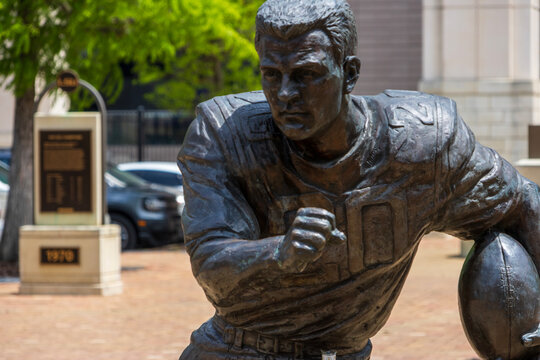 a monument and statue of the LSU college football player Billy Cannon at Tiger Stadium on the Campus of Louisiana State University in Baton Rouge Louisiana USA