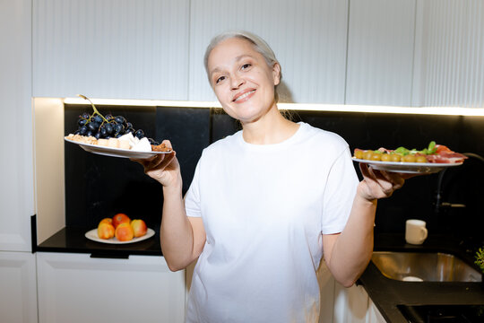Portrait of a woman with plates