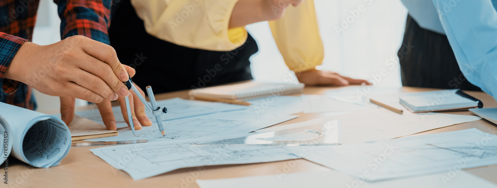 Poster skilled architect engineer team discuss about architectural project while project manager using lapt