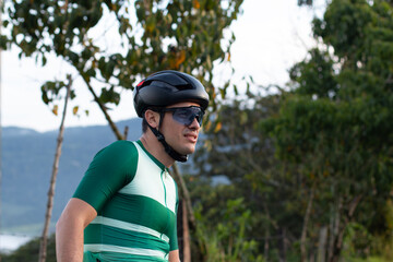 lifestyle and sport concept. medium outdoor shot. cyclist looking at the horizon