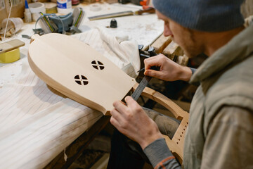 Guitar master working at his desk