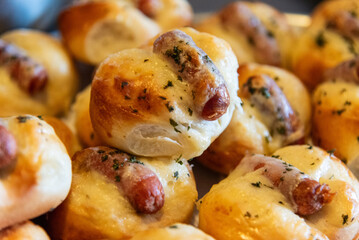 Baked bun with sausage - homemade delicious fresh food.