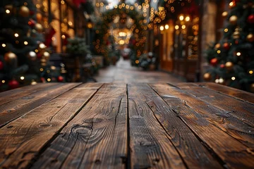 Zelfklevend Fotobehang Empty wood table with blur christmas market background with copy space © krishnendu