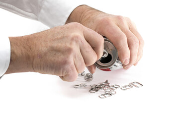 removing a pop can pull tab possibly collected for charity isolated on white