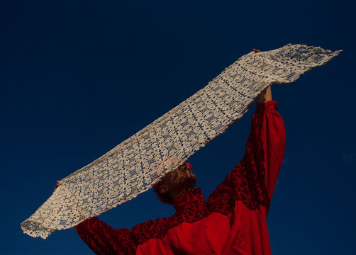 A girl in red with the white lace 