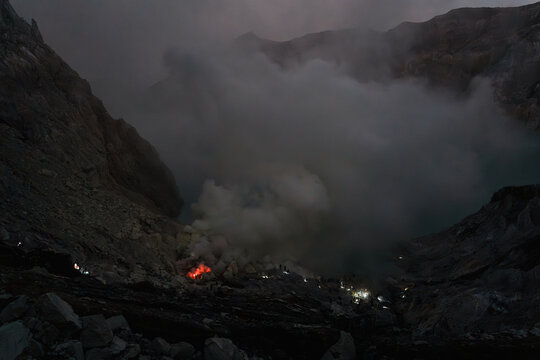 Sulfuric Smoke Rising From a Volcanic Lake at Dusk