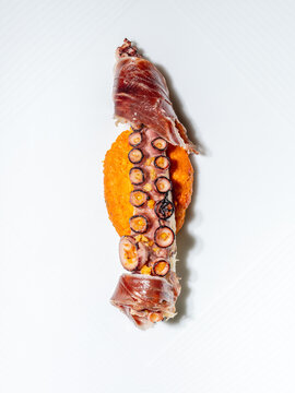 Grilled Octopus with crispy Pata Negra and Romesco Sauce