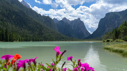 Amazing view of the famous Dobbiaco lake. Alpine lake. Italian Alps. Picturesque mountain lake at...