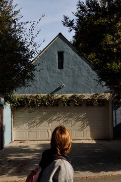 Girl near the garage