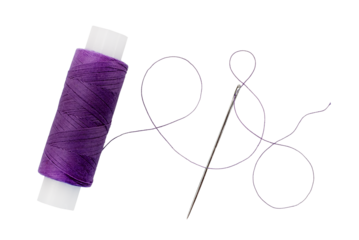 Old spool of thread and needle on a white background. Sewing accessories