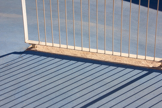 Shadow of a handrail