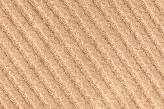 Beige knitted wool pattern macro