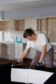 young man doing cleaning