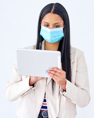 Business, mask and woman with tablet, typing and company regulations on white studio background. Person, model and employee with tech, face cover and internet for fake news and covid vaccine info