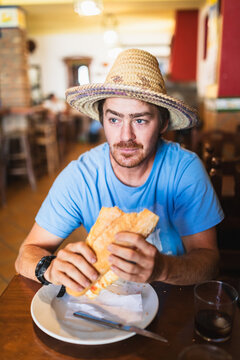 Excursionist man stoping for breakfast