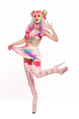 Playful female anime cosplayer in colorful costume