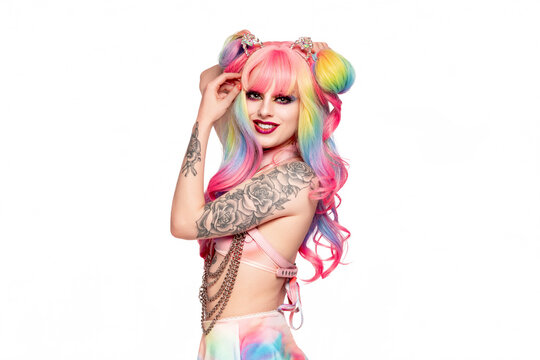 Portrait of beautiful young expressive female anime cosplayer in colorful costume
