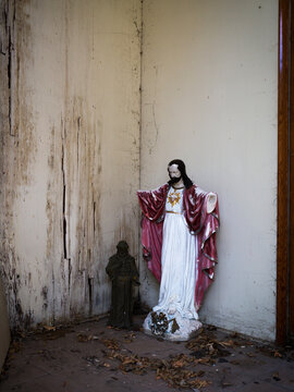A religious icon in a doorway.
