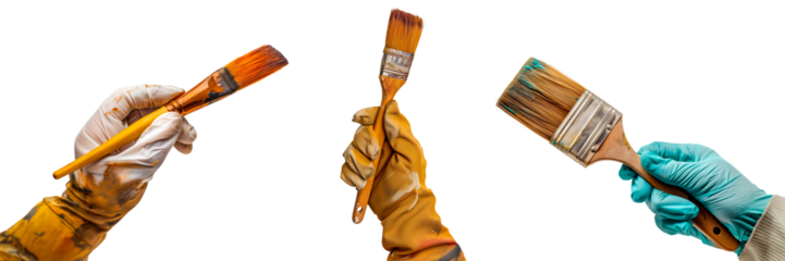 Set of brushes in a gloved hand isolated on a white or transparent background. Close-up of a brushes in hand, front view. Home renovation, artistic creativity. Graphic design element.