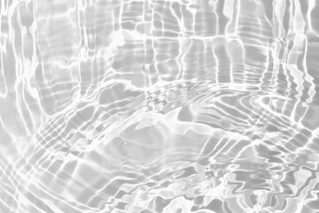 Abstract transparent clear calm white water shadow surface texture with splashes and bubbles or natural ripple background. Sunlight effect water texture on white background. Minimal summer concept