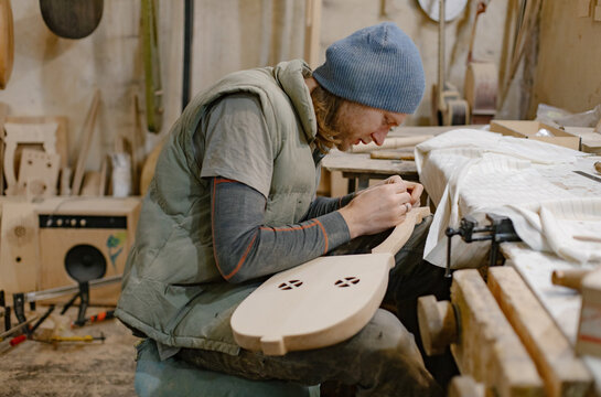 Guitar master working at his desk