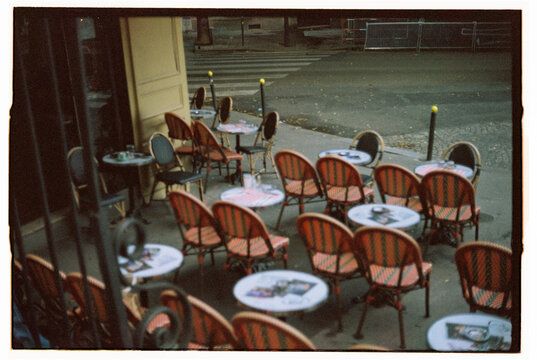 A classic Parisian cafe after the rain blurry view captured on film