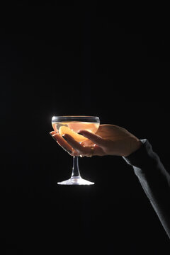 Female hand holds a Glass

