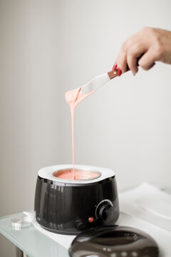 depilatory wax heated in the machine.