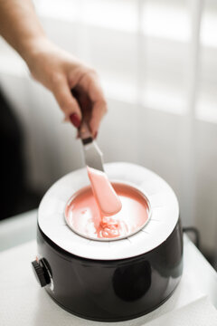 depilatory wax heated in the machine.